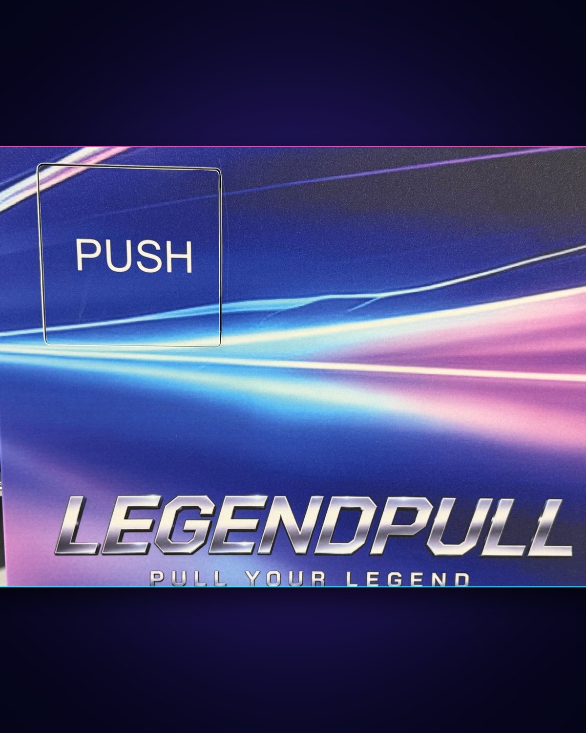 Close-up of the push door and Legend Pull logo at the base